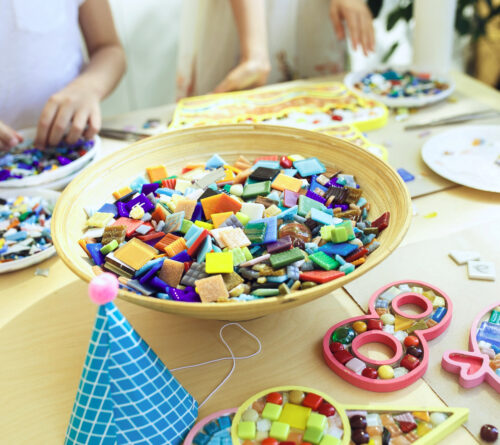 mosaic-puzzle-art-kids-children-s-creative-game-hands-are-playing-mosaic-table-colorful-multi-colored-details-close-up